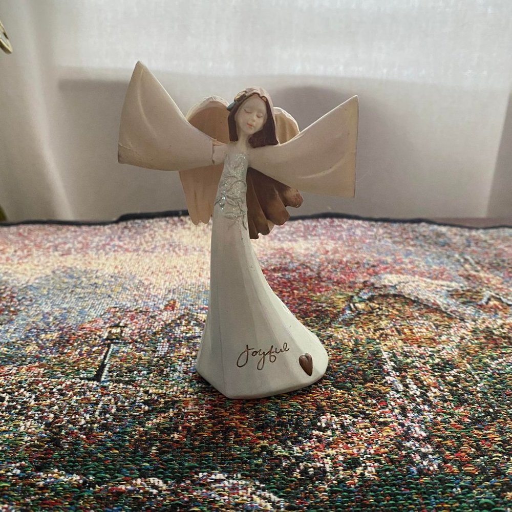 Two carved Angels